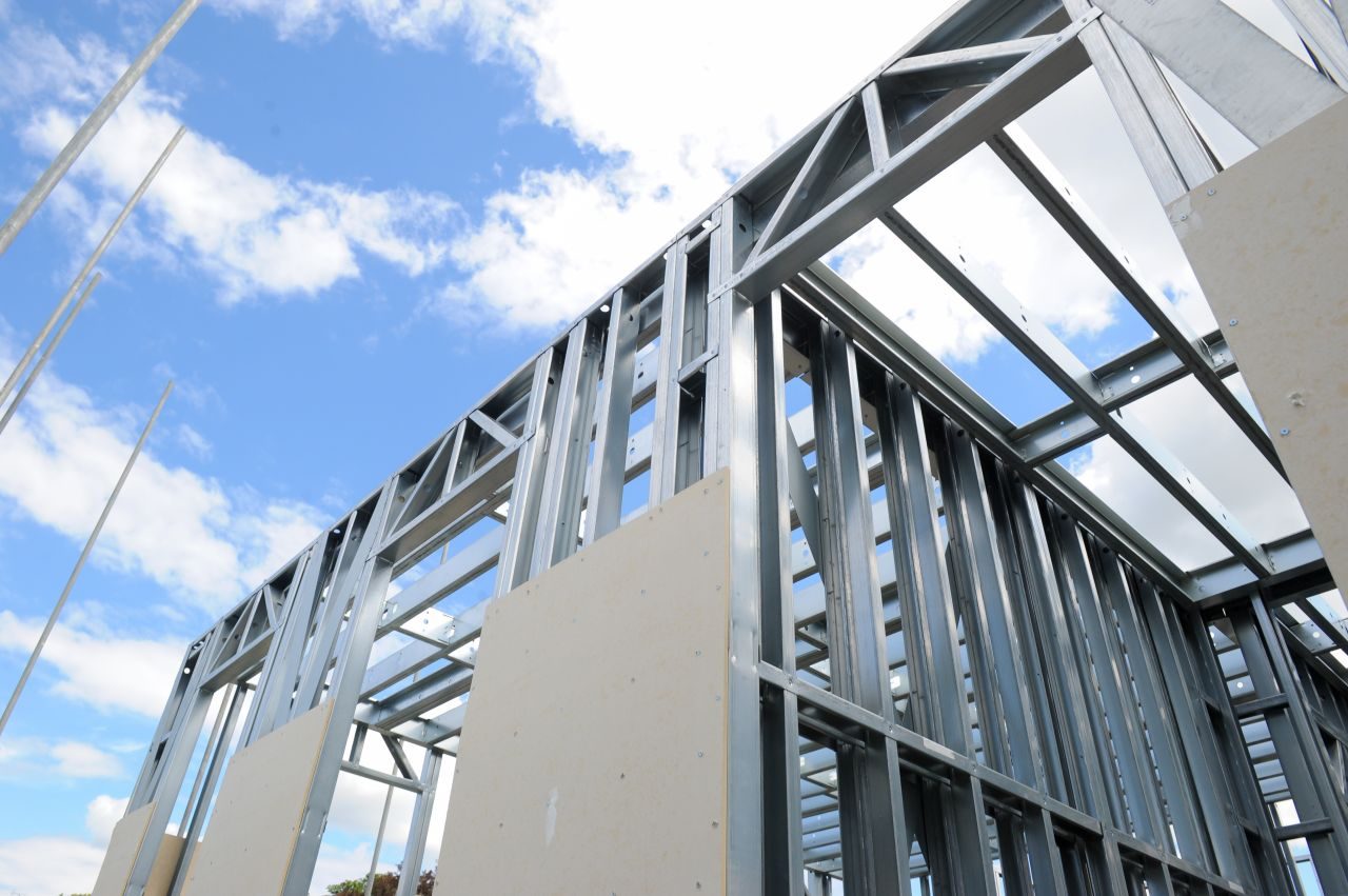 A corner of the pre-panelised frame with sheathing board fixed to the completed panels