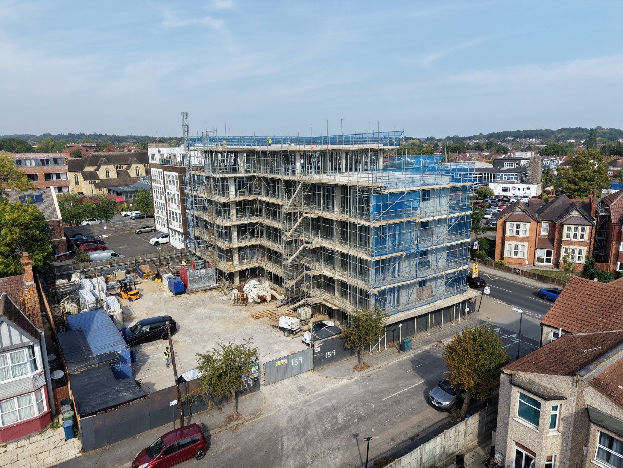 The frame and the working yard, with the loading area kept clear beside the building
