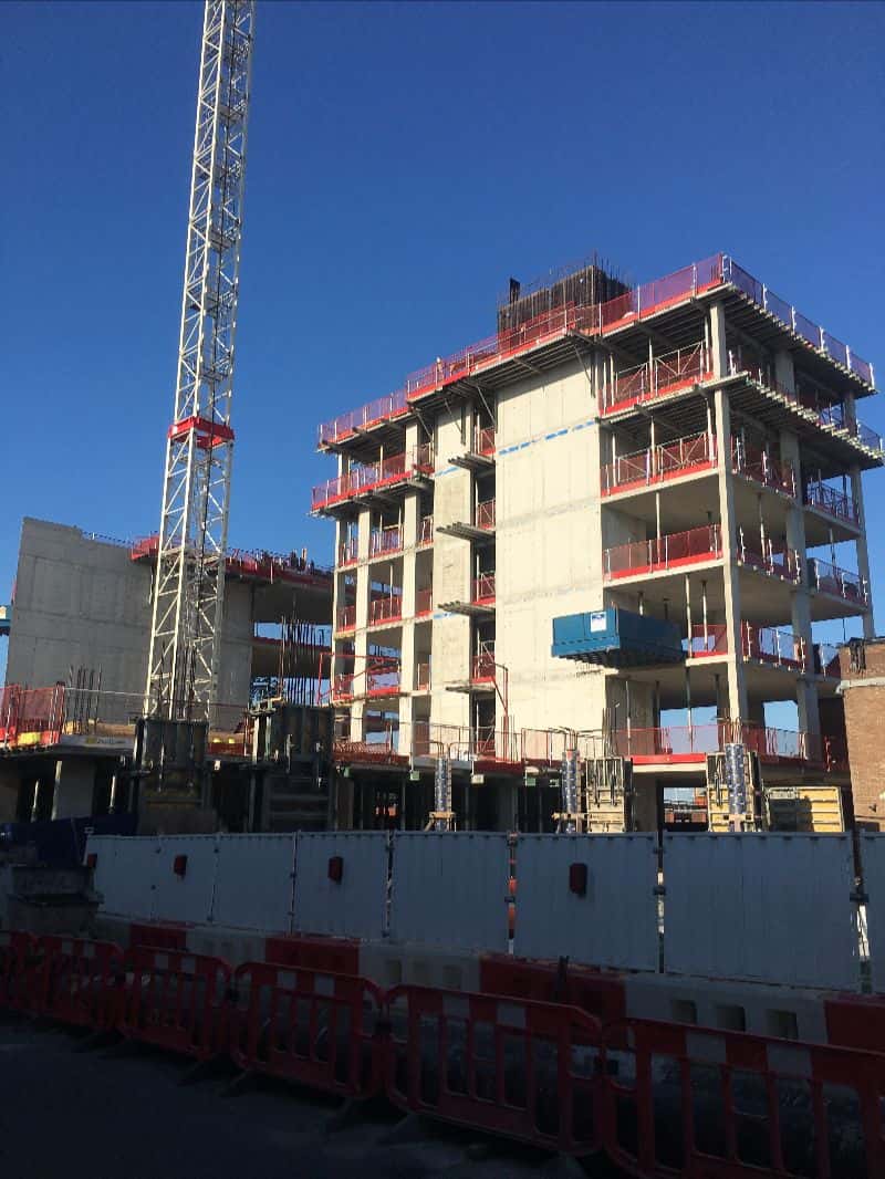 Concrete frame and tower crane at Hathaway House, London W9, with the upper storeys under construction