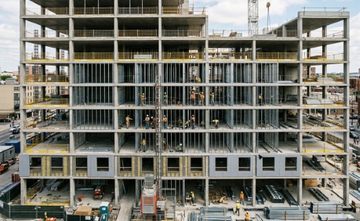 Close-up of SFS C-stud and U-track galvanized steel components showing precision fit for structural walling.